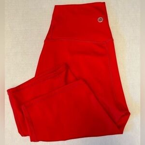 Papaya Active bright orange redish bike shorts in size Medium. C10